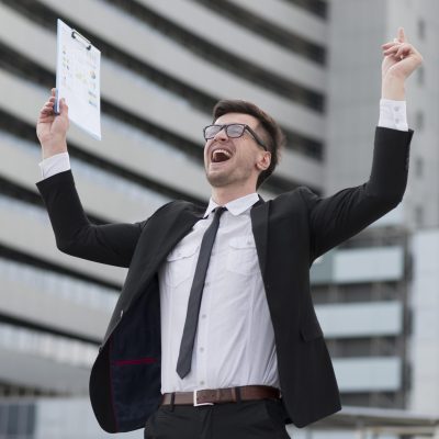 low-angle-happy-modern-man low-angle-happy-modern-man